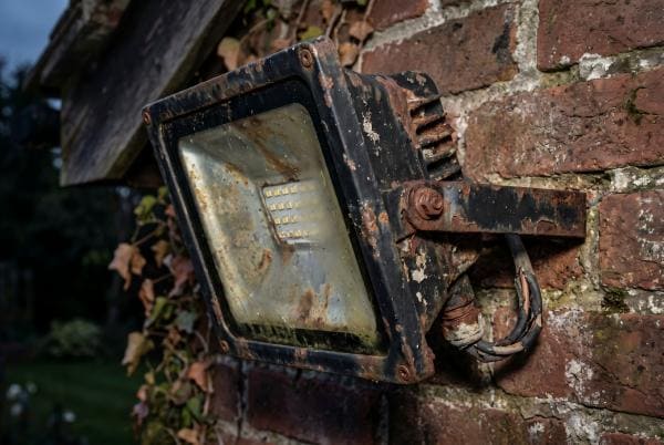 Corroded outdoor LED fixture